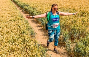 Lady running in a field