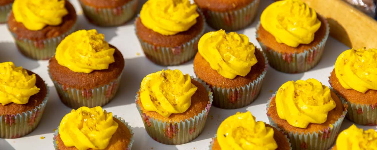 Cupcakes with yellow icing.